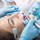 dental, dentistry, dentist, patient, doctor, medical, medicine, clinic, office, equipment, health, healthy, professional, instrument, healthcare, diagnostic, portrait, young, uniform, glove, girl, woman, female, people, care, treatment, bib, mirror, teeth, air, water, syringe, handpiece, protective, glasses, goggles, saliva, ejector, closeup, close-up